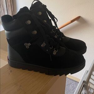 Sorel Black Lace Up Boots with Red accents on boots